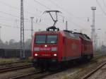 145 040-2+232 280-8 bei der Heimfahrt ins Kombiwerk Rostock-Seehafen fotografiert am 26.10.09 in Rostock-Toitenwinkel.