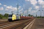 152 197-0 ITL - Eisenbahngesellschaft mbH mit einem VW Caddy Autotransportzug in Berlin-Schönefeld Flughafen und fuhr in Richtung Glasower Damm weiter.