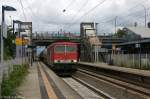 MEG 702 (155 179-5) Mitteldeutsche Eisenbahn GmbH mit dem leer Zementzug von Rostock-Seehafen nach Rüdersdorf, bei der Durchfahrt in Berlin-Hohenschönhausen.