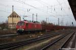 MEG 801 (156 001-0) mit einem Holzzug in Stendal Richtung Magdeburg unterwegs.