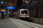 DB Taurus 182 004-2  Porsche  mit dem Warnemnde Express (RE 38590) in Berlin Hbf (tief).