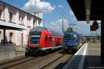 RE1 (RE 18120) von Frankfurt(Oder) nach Magdeburg Hbf, bei der Einfahrt in den Brandenburger Hbf und geschoben hatte die 182 009-1.