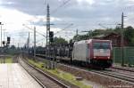 185 594-9 Crossrail mit leeren Autotransportzug in Rathenow auf dem Weg nach Wustermark.