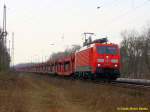 189 055 mit Autotransportzug in Berlin-Friedrichshagen auf dem Weg nach Osten am 20.02.2015