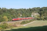 111 214-3 schiebt die RB 59157 Nürnberg - München und gleich in den Esslinger Tunnel.