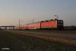 143 319-2 schiebt die S10 nach Halle/Saale bei Schkeuditz West.