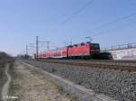 143 944-7 schiebt S37048 nach halle kurz vor Schkeuditz.