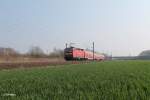 143 610 schiebt ihre RB 26113 Dessau - Leipzig bei Podelwitz.