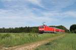 143 166 schiebt ihre RB 75 15759 Wiesbaden - Aschafenburg bei der Netztrennstelle Bischofsheim.