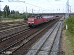 143 877-9 durchfhrt Eisenhttenstadt mit ein RB11 Cottbus.