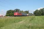 151 075-9 mit einem LKW-Walter Wechselpritschenzug zwischen Nauheim und Groß-Gerau.