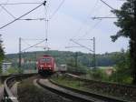 185 307-6 zieht ein Containerzug ber die Donaubrcke bei regensburg-Prfering.