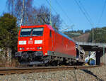 Die 185 174-0 der DB Schenker Rail zieht einen gemischten Gterzug in Richtung Kln, hier am 02 Mrz 2013 in Betzdorf/Sieg bei km 122,8.