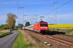 Mit dem IC 1989 nach Nürnberg rauscht die 101 077 am 04.05.2014 durch den Abzw.Riekdahl in Richtung Rostock Hbf.