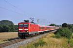 114 005 ist mit ihrem Kreuzfahrer Sonderzug bei Niex auf dem Weg nach Berlin.