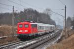 Mit dem IC 2239 ist die frisch untersuchte 115 114 in Warnemünde gestartet.In Sildemow kurz hinter Rostock wurde der Zug abgepasst.Geknipst am 31.01.2014.