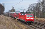 Mit einem ordentlichen  Kilometerzhler  in einer Achse rollt die 120 208 mit dem RE 4310(Rostock-Schwerin-Hamburg) durch Sildemow ihrem nchsten Halt Schwaan entgegen.