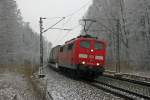 151-049 mit Gterzug bei Grokarolinenfeld zwischen Mnchen und Rosenheim am 28.1.2012.