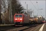 185 078 am 12.03.11 mit einem gemischten Gterzug in Richtung Koblenz bei der Durchfahrt von Bonn Beuel