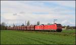 185 338 und 185 270 mit einen Kohlezug am 24.04.12 in der Nhe von Neuss