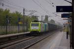 185 543-6 Captrain Deutschland GmbH für ITL - Eisenbahngesellschaft mbH mit der Wagenlok 186 133-5 und einem Containerzug, bei der Durchfahrt im verregneten Berlin-Hohenschönhausen und fuhr