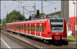 425 058 mit RE 11 nach Mnchengladbach am 04.06.11 in Kamen