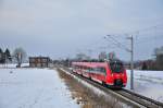 Der 442 241 rollt am 13.02.2012 durch Gragetopshof in Richtung Kavelstorf.Nach dem Kopf machen fhrt der Zug ber Rostock-Seehafen zurck zum Hbf.