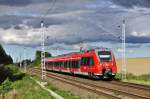 Als S2 nach Warnemünde rollt der 442 347 aus Güstrow kommend in Richtung Rostock,hier zwischen Papendorf und Dalwitzhof geknipst am 29.09.2015.