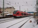 429 028 verlie mit 30 km/h am 08.Dezember 2010 mit dem RE Rostock-Sassnitz den Bahnhof von Bergen/Rgen.