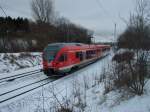 429 030 am 15.Dezember 2010 als RE Binz-Stralsund in der Nhe vom Einfahrsignal von Bergen/Rgen.