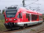 RE 33212 von Sassnitz Richtung Rostock Hbf kurz vor der Einfahrt im Rostocker Hbf.(25.09.10)