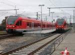 Whrend 429 029 als RE 33313 Stralsund-Binz den Bahnhof Lietzow verlie,wartete 429 027 mit dem RE 33263 Lietzow-Sassnitz auf Anschlureisende.