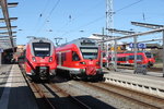 442 837,429 527-5,120 202-7 und 442 855 am 01.04.2016 im Rostocker Hbf