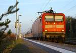 112 173-0 mit einem SH Express nach Hamburg hier festgehalten bei der Abfahrt in Schleswig. 11.11.2014