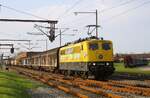 Ausfahrt der gelben EGP 151 007 mit dem Zementexpreß nach Deuna aus dem DSB Grenzbahnhof Pattburg/Padborg 30.04.2024