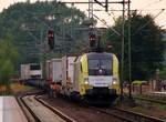 MRCE/TXL 6182 511-6(REV/Lz/30.03.12) rauscht hier mit dem DGS 24779 durch Schleswig. 27.07.2014