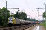 MRCE/TXL 182 596-7 oder ES64U2-096 rauscht hier mit dem 4056x durch Schleswig, das Ziel ist Padborg. 03.08.2014