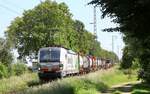 RP/KombiRailEurope 193 128-6 mit Tragwagenzug, Bü Peelsheine bei Boisheim 08.06.2024