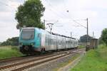 Eurobahn ET4.03 2429 013-2 ff als RE nach Rheine passiert den Bü Lotte, 05.06.2024
