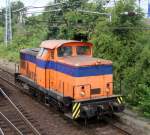 Die V60 der Firma Rostocker Fracht-und Fischereihafen GmbH beim Rangieren im Bahnhof Rostock-Bramow.19.07.2013