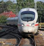 411 001-1 als ICE 1509 von Warnemnde nach Mnchen Hbf bei der Einfahrt im Rostocker Hbf.10.08.2013