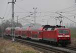 120 201-9 mit RE 4311 von Hamburg Hbf nach Rostock Hbf bei der Durchfahrt in Sildemow,18.03.2012