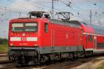 112 155-7 noch mit Logo Mein Weg.Der Nahverkehr in Schleswig Holstein mit RE 4306 von Rostock Hbf nach Hamburg Hbf bei der Ausfahrt im Rostocker Hbf.06.07.2014