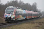 Werbehamster 442 354 als S1(Warnemünde-Rostock)bei der Einfahrt in Rostock-Lichtenhagen.02.02.2019