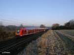 Der RE4241 Nrnberg - Mnchen bei Sonnenaufgang am 29.10.10