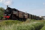 99 2322-8 mit MBB14619 von Ostseebad Khlungsborn West nach Bad Doberan aufgenommen zwischen Ostseebad Khlungsborn Ost und Steilkste/Wittenbeck.(09.07.2011)