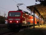 143 250-9+S2 von Warnemnde nach Gstrow kurz vor der Abfahrt im Bahnhof Warnemnde.16.10.2011