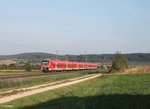 440 038-8 und 440 822-5 als RB 58126 Treuchtlingen - Würzburg bei Wettelsheim.