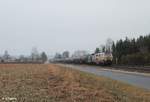 217 002 und V1253 ziehen bei Rothenstadt einen Kesselzug aus Cheb nach Ingolstadt.