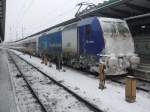 InterConnex80003 von Leipzig Hbf Richtung Warnemnde stand auch sehr verschneit im Rostocker Hbf.(17.01.10)